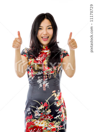 Asian young woman showing thumbs up from both hands isolated on white background 11178729