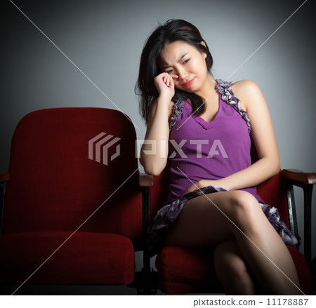 Attractive Asian girl 20s at the theatre isolate white backgroun Attractive Asian girl 20s at the theatre isolate white backgroun 11178887