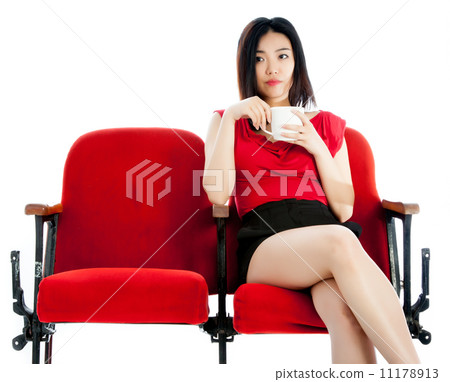 Attractive Asian girl 20s at the theatre isolate white backgroun Attractive Asian girl 20s at the theatre isolate white backgroun 11178913