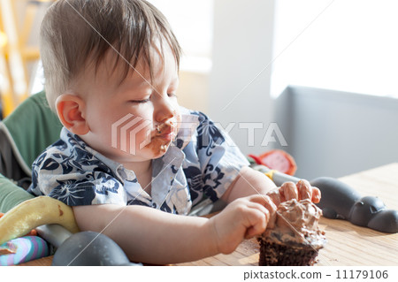 Boy eating a birthday cake Boy eating a birthday cake 11179106