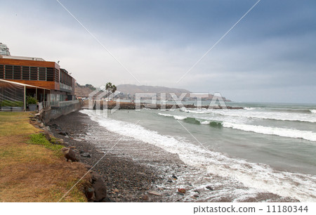 Waves breaking at a coast, Miraflores, Lima, Peru Waves breaking at a coast, Miraflores, Lima, Peru 11180344