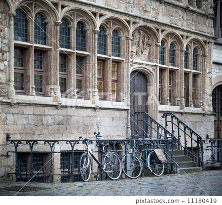 Cycles parked in front of a house, The Graslei, Ghent, Belgium 11180419