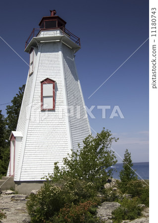 Low angle view of a lighthouse, Big Tub Lighthouse, Manitoulin Island, Lake Huron, Georgian Bay, Tobermory, Ontario, Canada 11180743