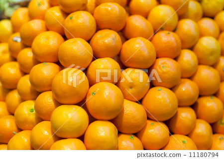 Oranges for sale at a market stall Oranges for sale at a market stall 11180794