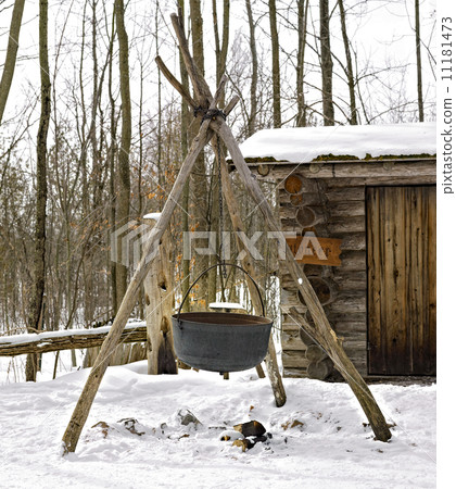 Cooking food at fireplace in ski resort, Orangeville, Dufferin C 11181473