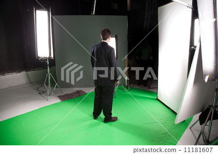 Male fashion model standing in a film studio Male fashion model standing in a film studio 11181607