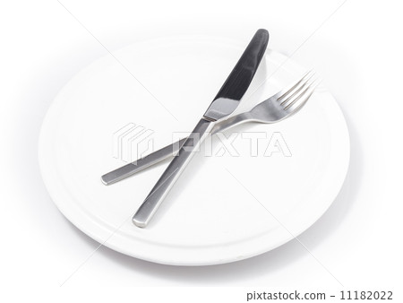 fork and knife in plate isolated on a white background fork and knife in plate isolated on a white background 11182022