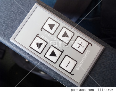 Push buttons on the armrest of airplane seat 11182396