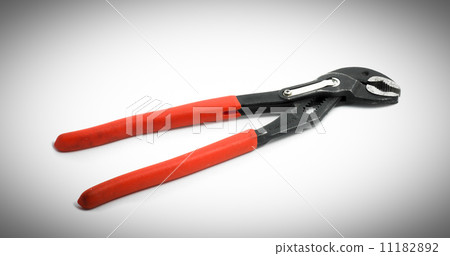 red wrench isolated on a white background red wrench isolated on a white background 11182892