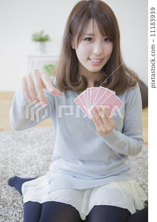 A woman playing cards 11183939