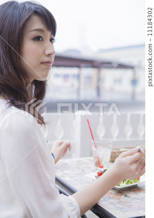 Woman eating salad Woman eating salad 11184302