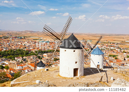 Ancient windmills in the sunny summer day, Konsuegra, Spain 11185482