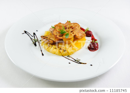 Quail breast with polenta, apple chutney and cherry-cognac sauce Quail breast with polenta, apple chutney and cherry-cognac sauce 11185745