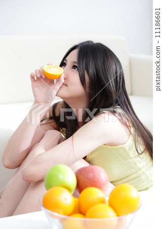 woman with fresh fruits orange 11186601