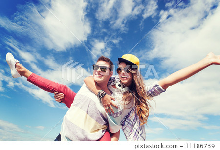 teenagers having fun outside 11186739