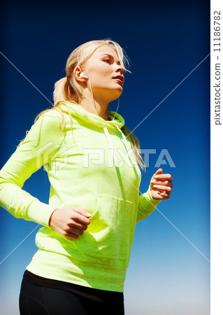 woman doing running outdoors woman doing running outdoors 11186782