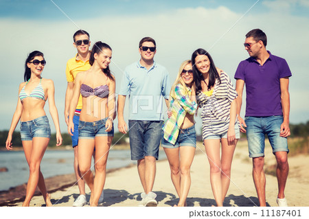 group of friends having fun on the beach group of friends having fun on the beach 11187401