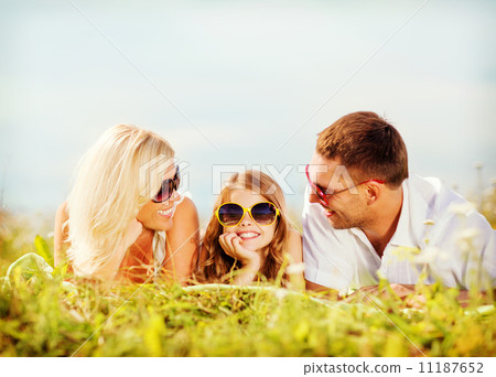 happy family with blue sky and green grass 11187652