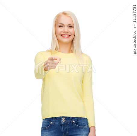 smiling woman pointing finger at you 11187781