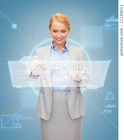 smiling businesswoman working with virtual screen 11188011