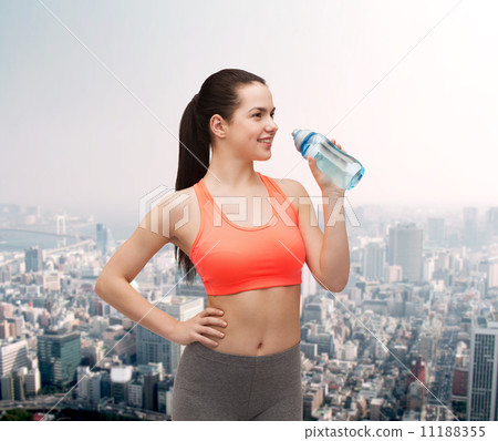 sporty woman with water bottle sporty woman with water bottle 11188355