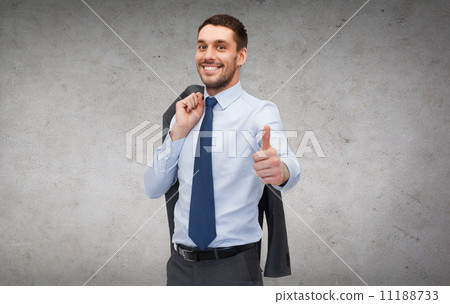 handsome buisnessman with jacket over shoulder 11188733