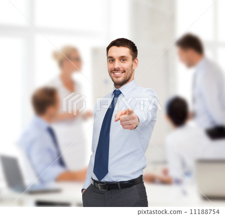 handsome businessman pointing finger at you handsome businessman pointing finger at you 11188754