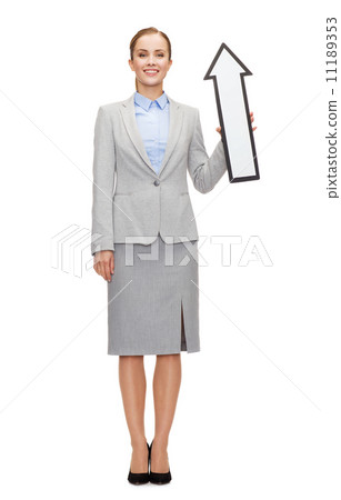 smiling businesswoman with direction arrow sign smiling businesswoman with direction arrow sign 11189353