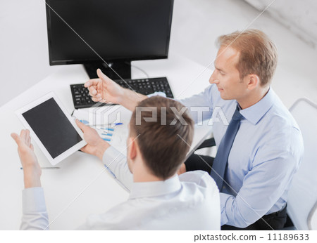 businessmen with notebook and tablet pc businessmen with notebook and tablet pc 11189633