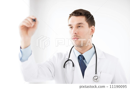 young doctor working with something imaginary 11190095