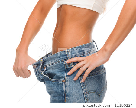 close up of female showing big jeans 11190224