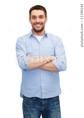smiling man with crossed arms 11190244