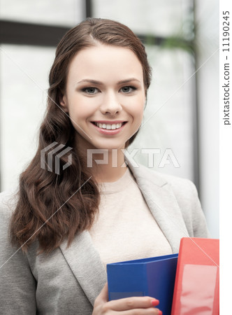 beautiful smiling woman with folder beautiful smiling woman with folder 11190245