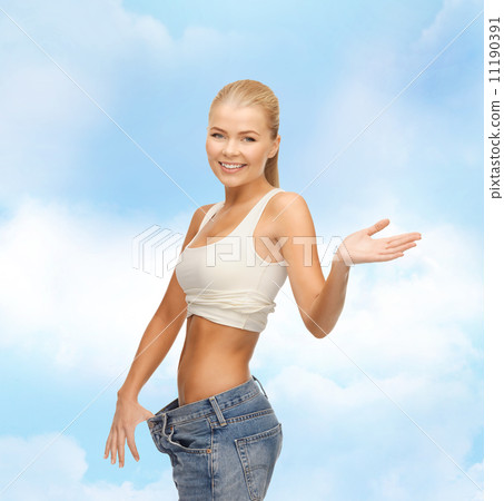 sporty woman showing big pants sporty woman showing big pants 11190391