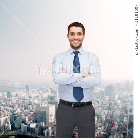 handsome businessman with crossed arms handsome businessman with crossed arms 11191007