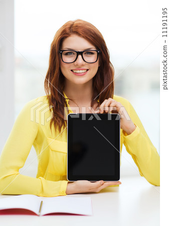 smiling student girl in eyelgasses with tablet pc smiling student girl in eyelgasses with tablet pc 11191195