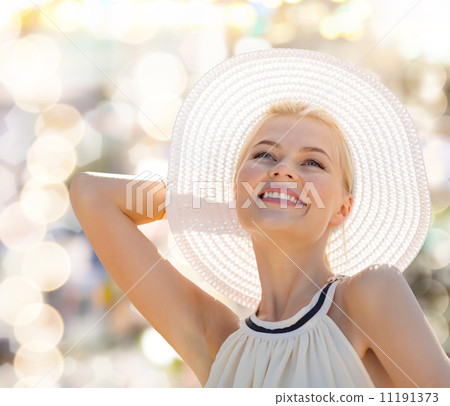 beautiful woman enjoying summer outdoors 11191373
