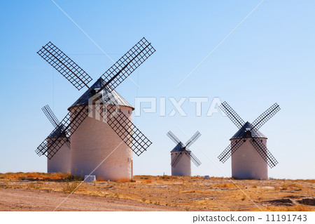 Group of retro windmills in field Group of retro windmills in field 11191743