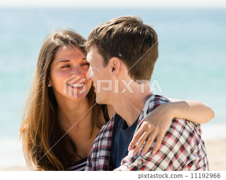 Girl and her boyfriend embrace 11192966