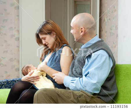 Mother breast feeding newborn baby Mother breast feeding newborn baby 11193156