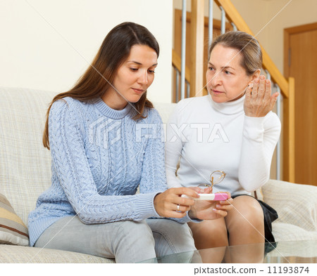 woman consoling the worried daughter