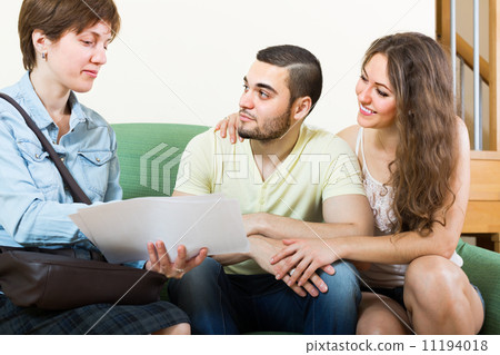 Adult couple on sofa in home Adult couple on sofa in home 11194018