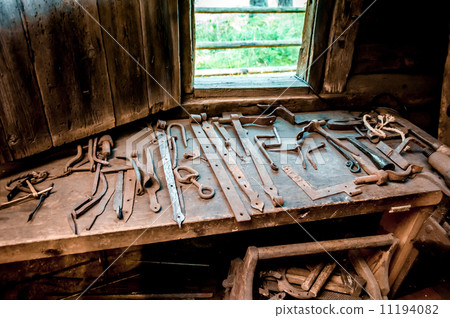 Farrier tools in ancient smithy 11194082