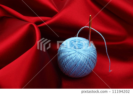 thread on red silk 11194202