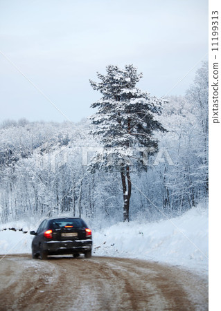 car on winter road car on winter road 11199313
