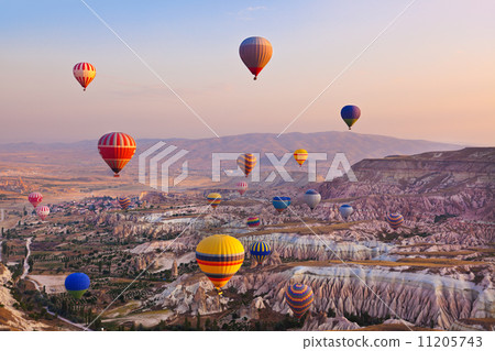Hot air balloon flying over Cappadocia Turkey Hot air balloon flying over Cappadocia Turkey 11205743