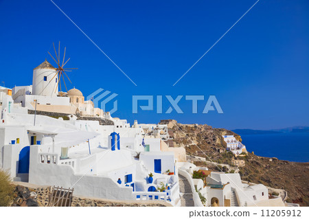 Windmill in Oia at Santorini island, Greece 11205912