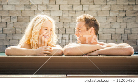 young couple at the pool young couple at the pool 11206456