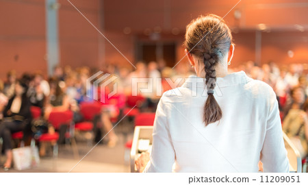 Female academic professor lecturing at the faculty. Female academic professor lecturing at the faculty. 11209051