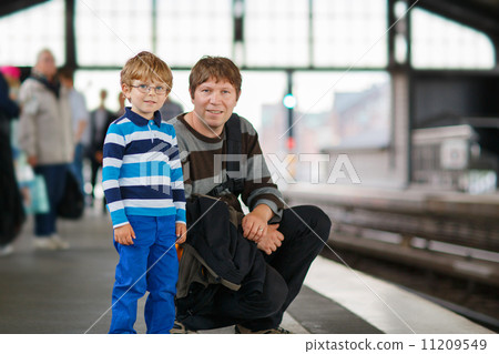 Happy little boy with father in a subway station. Happy little boy with father in a subway station. 11209549